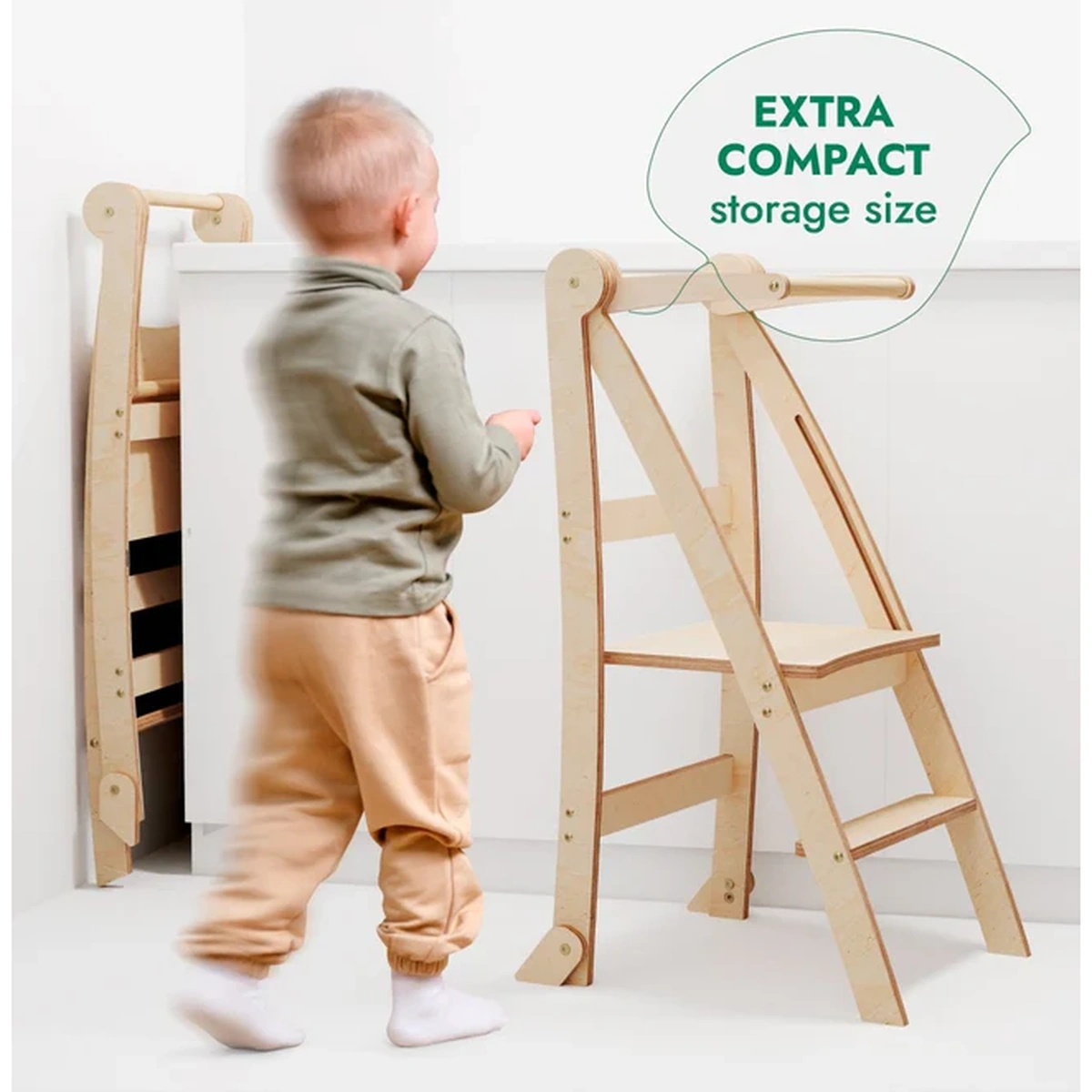 Foldable learning tower displayed beside a child with compact storage positioning